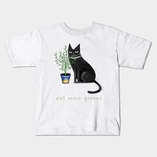 Cartoon black cat with a home flower in a pot and the inscription "Eat more greens". Kids T-Shirt